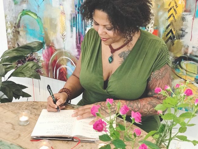 Niema Writing With Roses